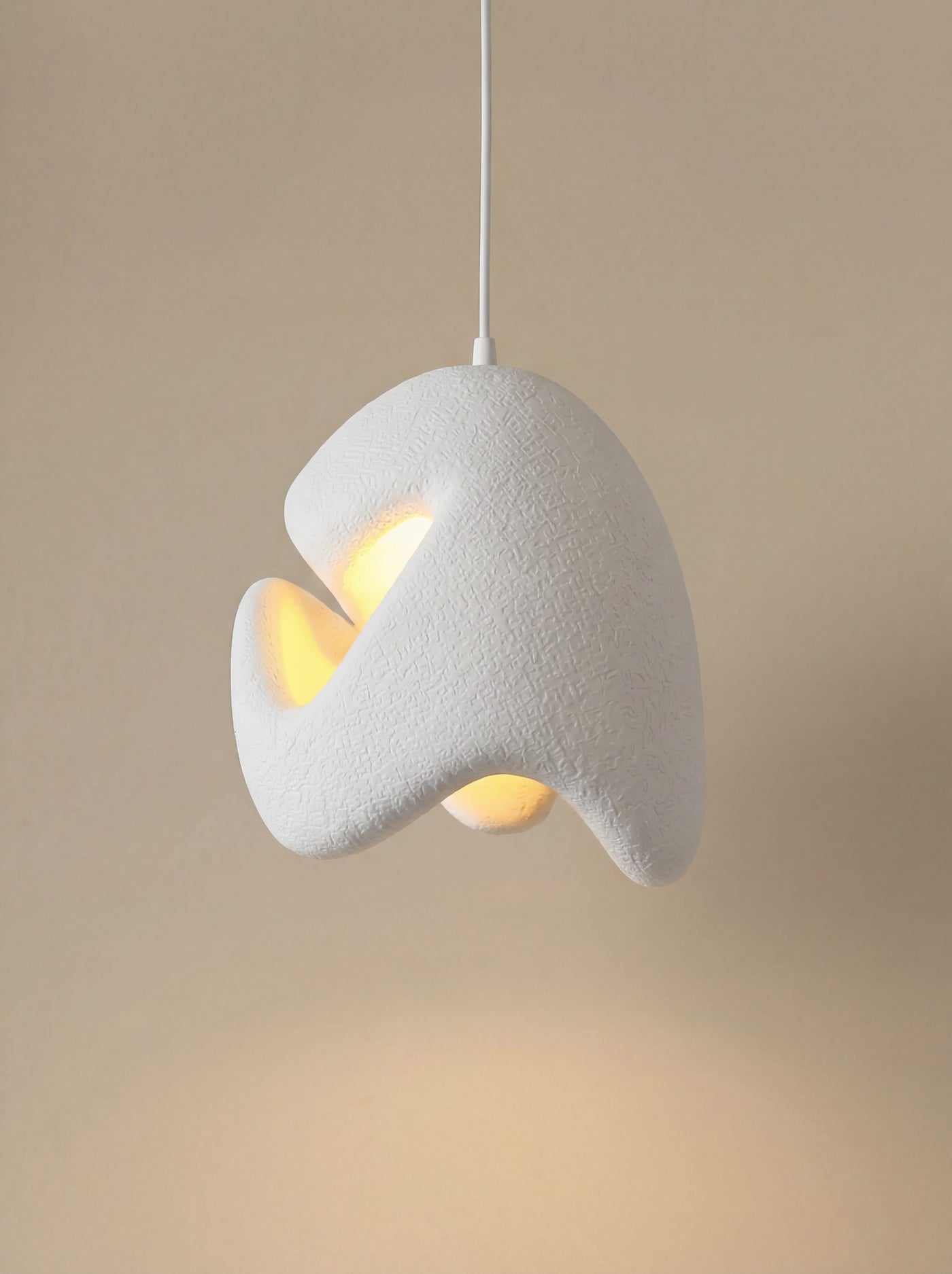 Alvea Woven Rattan Pendant Lamp detail view - Maison Moya sculptural pendant lamp