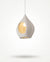 Linear pendant centred over a dining table